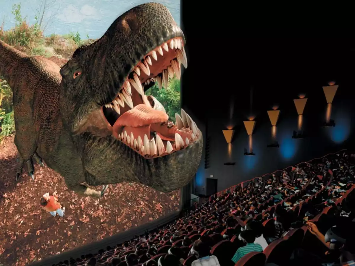 Dinousario saliendo de una pantalla de cine 3D